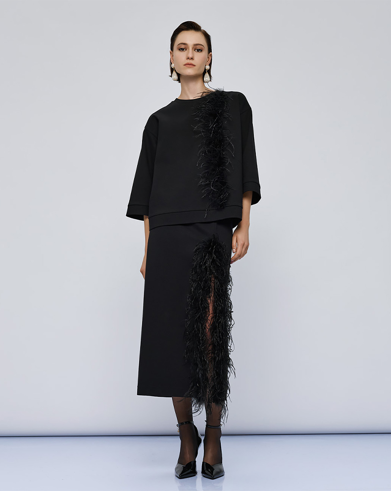 MIDI SKIRT WITH FEATHERS