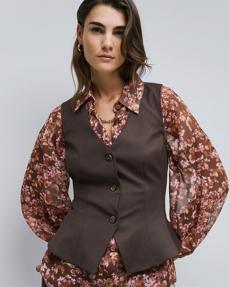 VEST WITH GODET